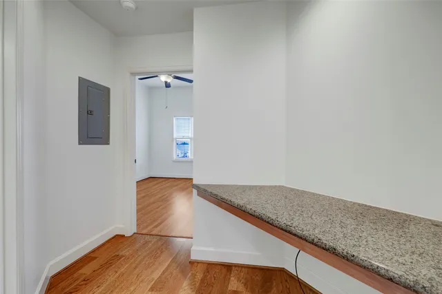 a view of wooden floor and staircase