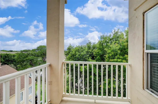 a view of a wooden fence