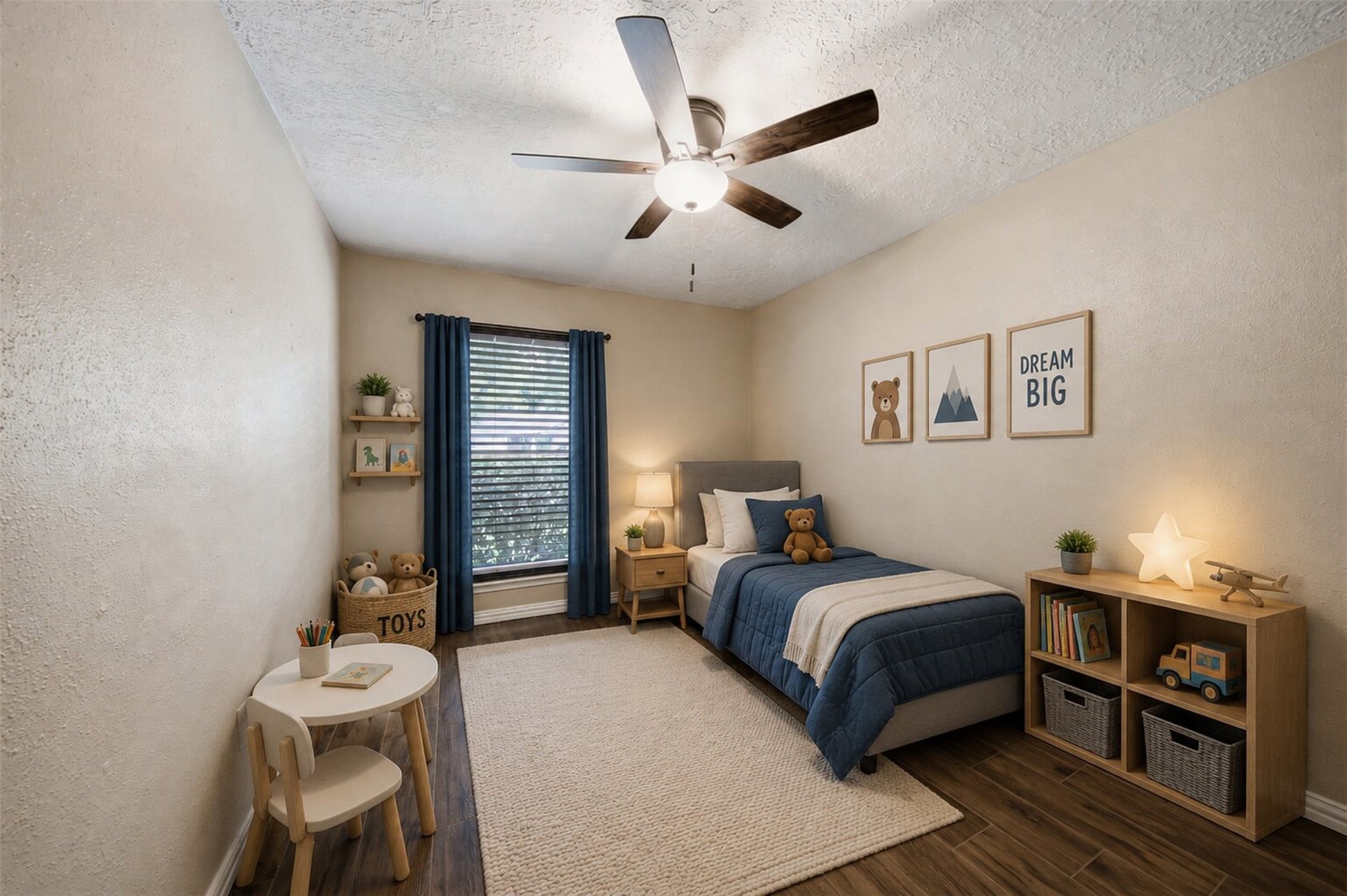 9418 Kilrenny Drive Spring, TX 77379 - Photo 13 of 47 a bedroom with a bed and a chandelier