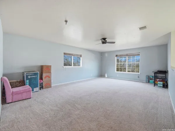 a view of livingroom with furniture and a window