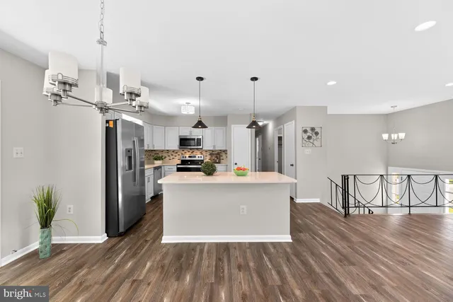 a view of kitchen and living room
