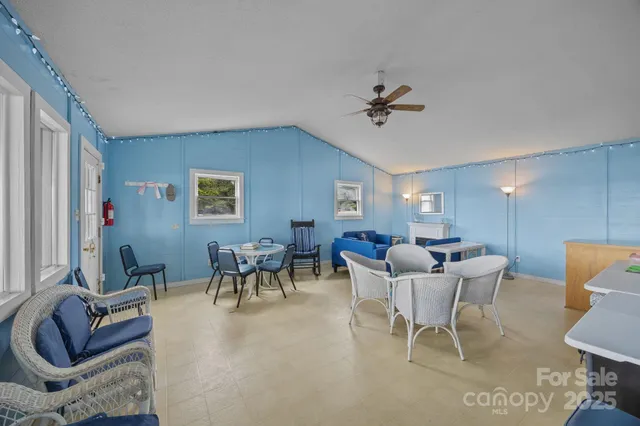 a view of a lake with boats and trees