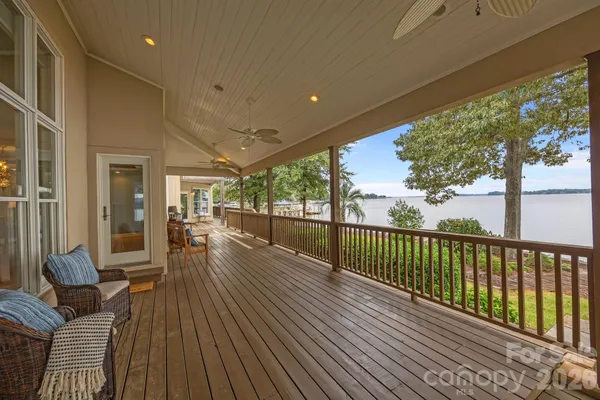 a kitchen with kitchen island granite countertop a stove and a sink