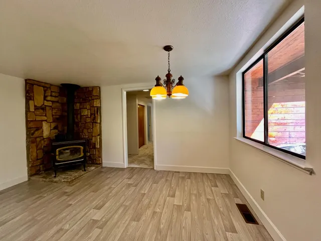 a view of a livingroom with furniture and window