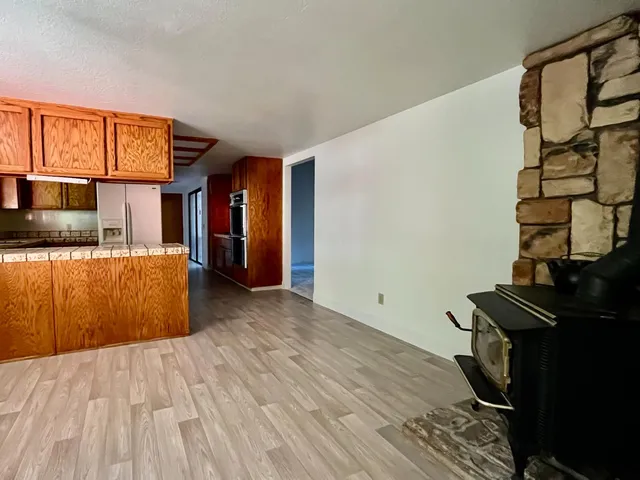 a view of a living room with a flat screen tv