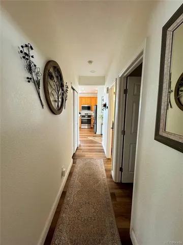 a view of a hallway with elevator