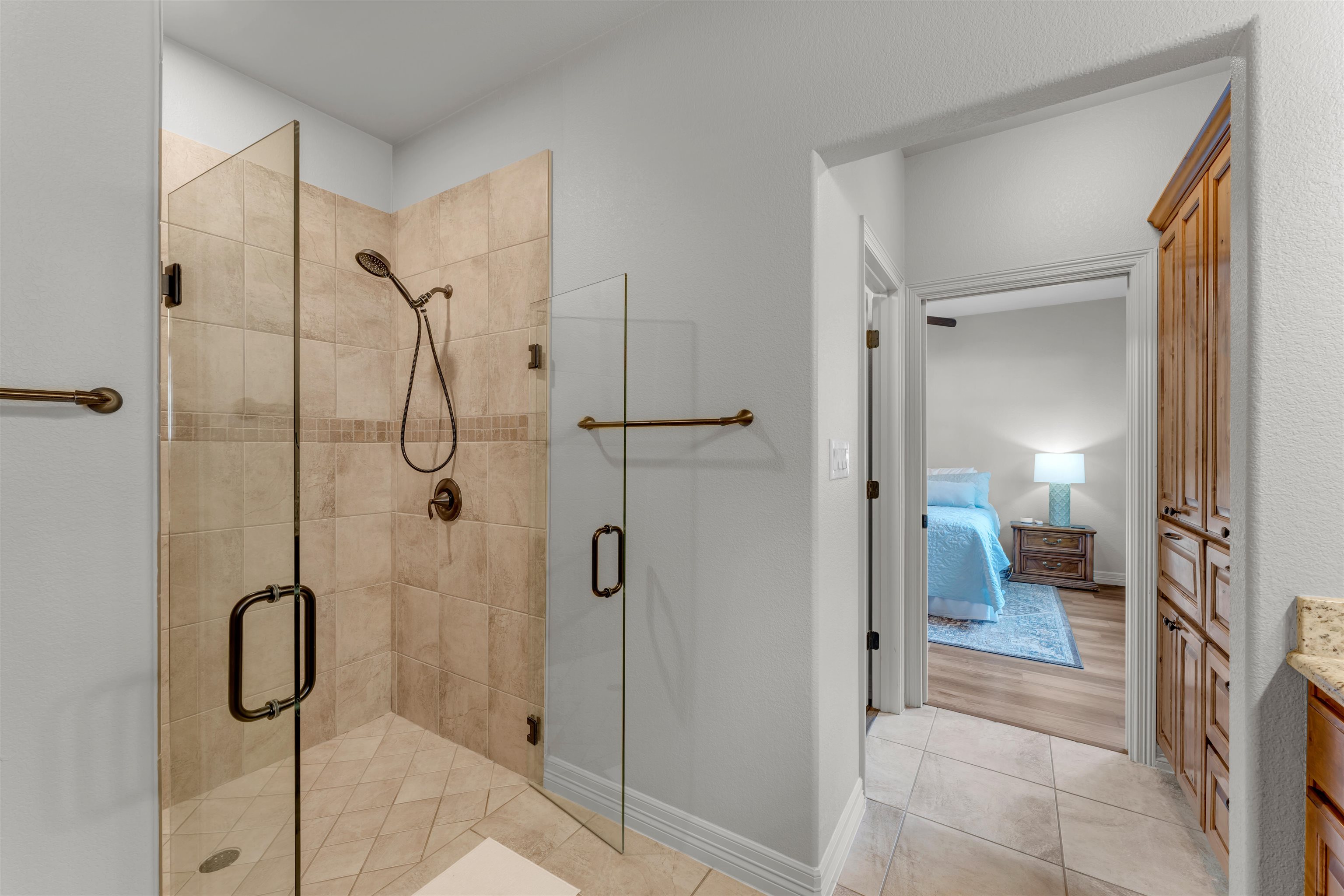 227 Watkins Point Kingsland, TX 78639 - Photo 14 of 30 a bathroom with a shower and a sink