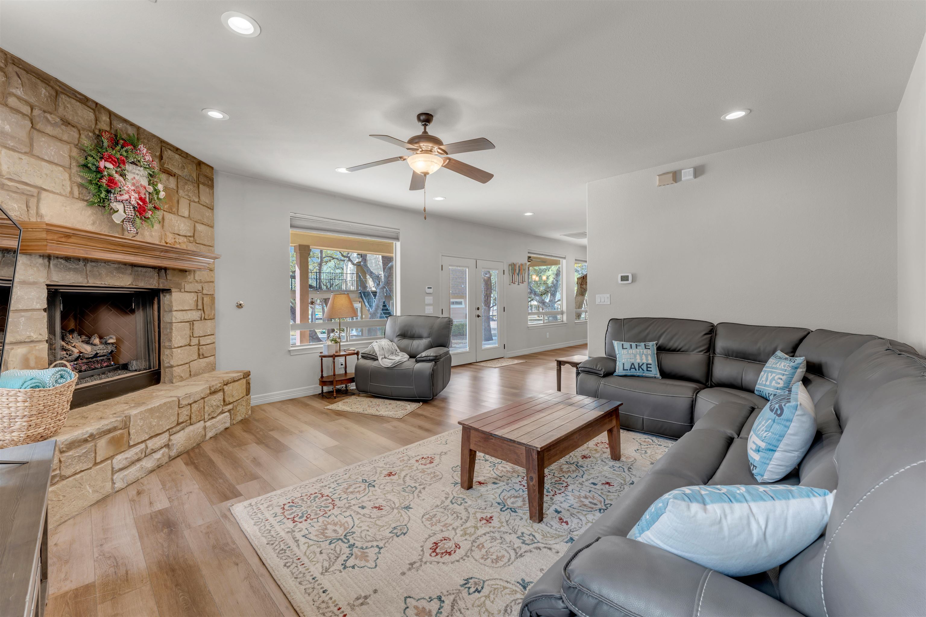 227 Watkins Point Kingsland, TX 78639 - Photo 16 of 30 a living room with furniture and a fireplace