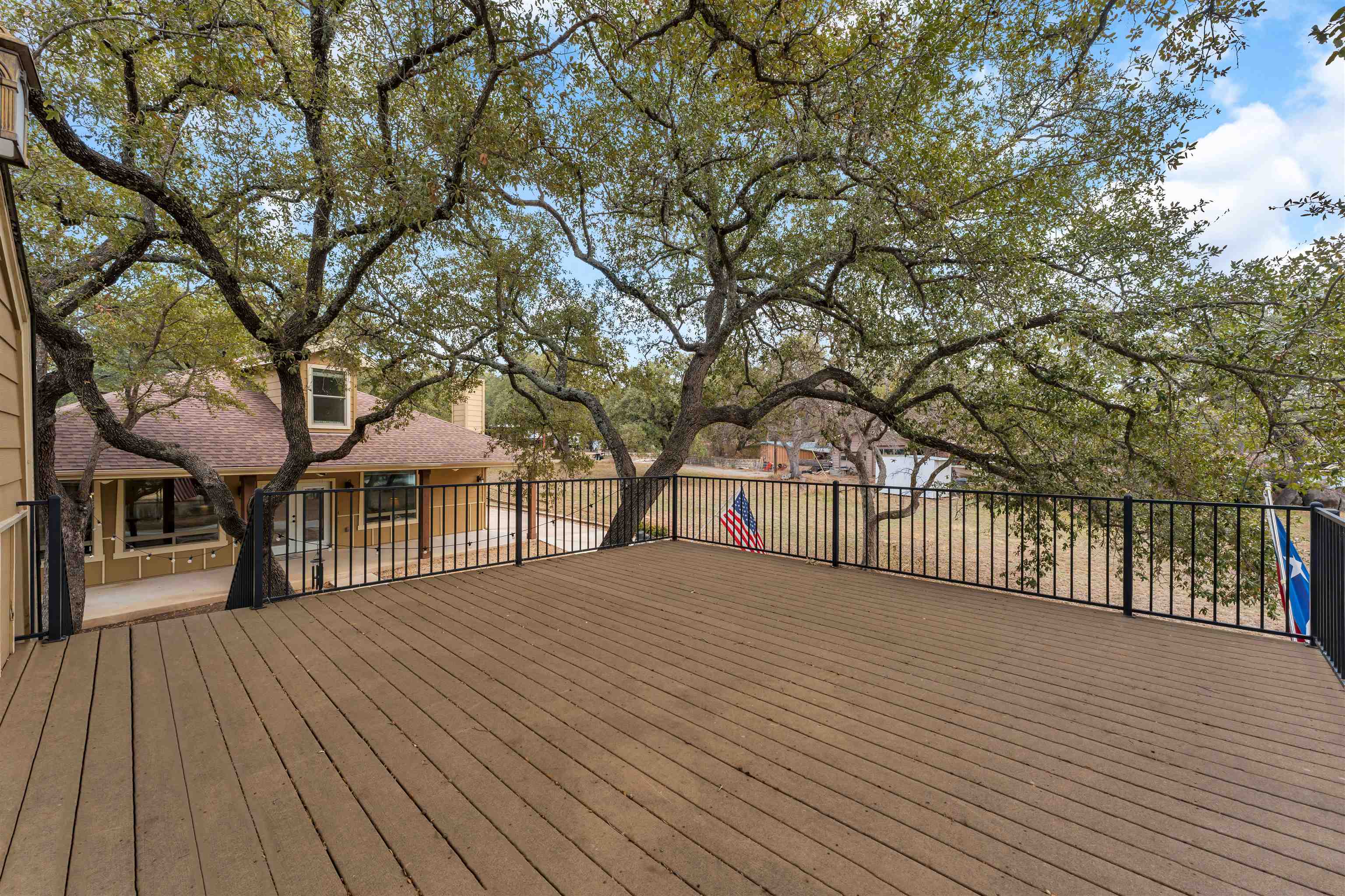 227 Watkins Point Kingsland, TX 78639 - Photo 26 of 30 a view of a house with a deck