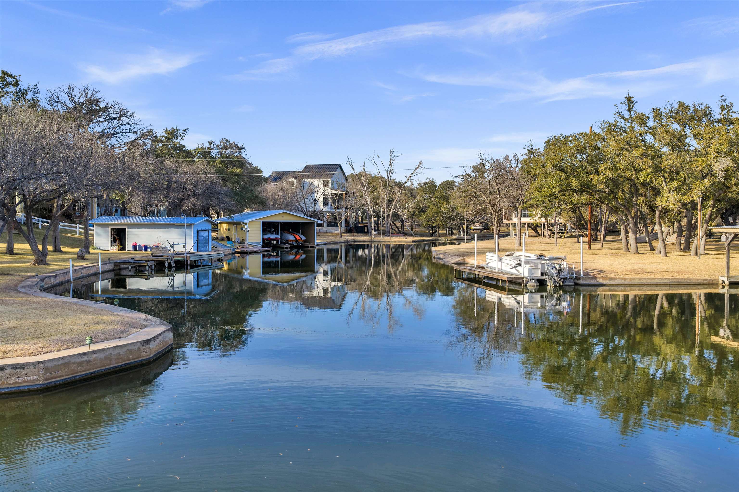 227 Watkins Point Kingsland, TX 78639 - Photo 29 of 30 a view of a lake with boats and trees around