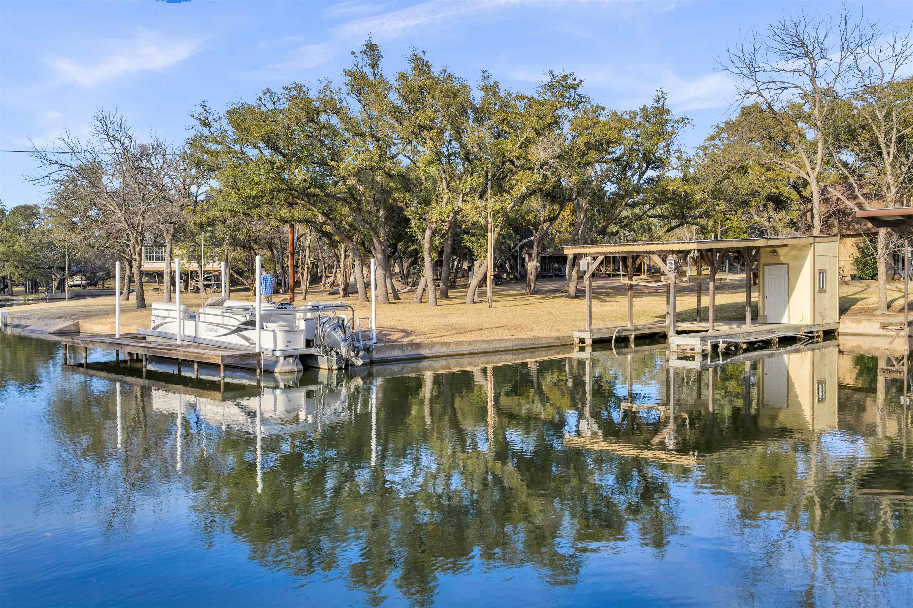 227 Watkins Point Kingsland, TX 78639 - Photo 30 of 30 a view of a lake with boats and trees around