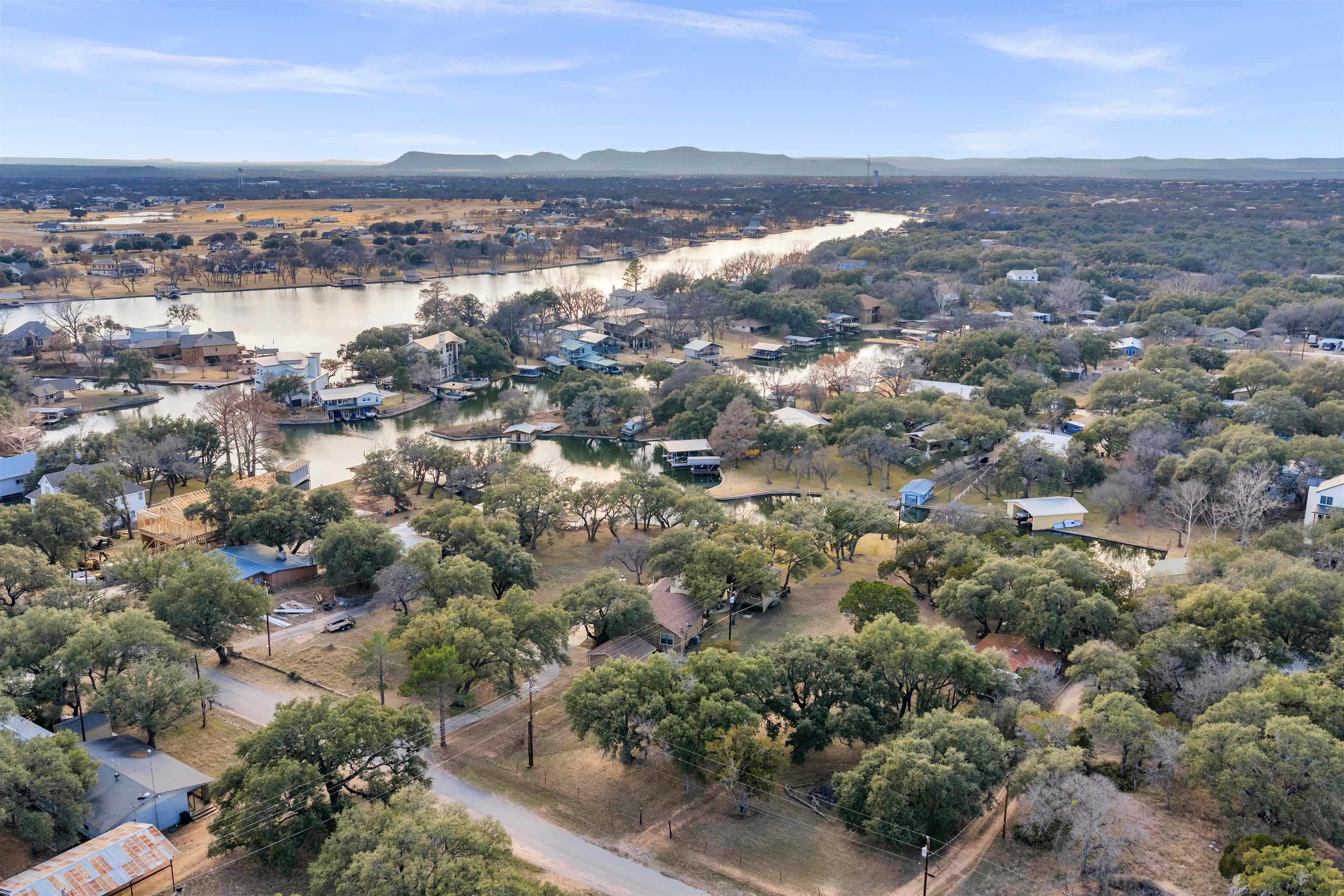 227 Watkins Point Kingsland, TX 78639 - Photo 3 of 30 an aerial view of residential houses with outdoor space and trees