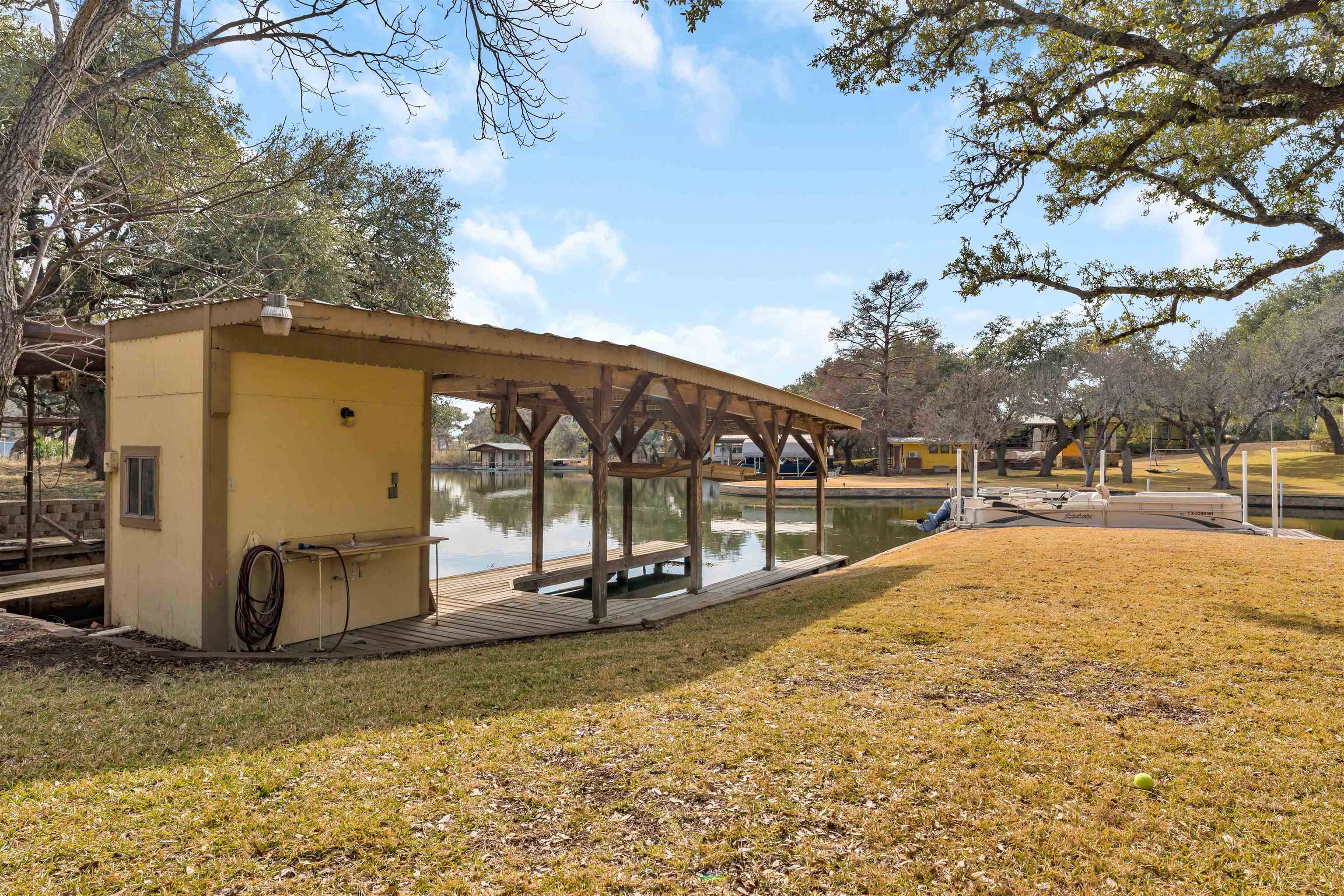 227 Watkins Point Kingsland, TX 78639 - Photo 7 of 30 a view of a house with snow on the background