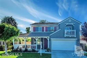 a front view of a house with a porch