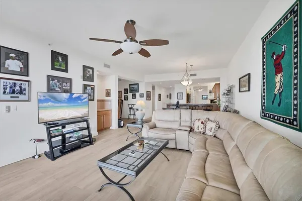 a kitchen with a sink a center island cabinets and a counter top space