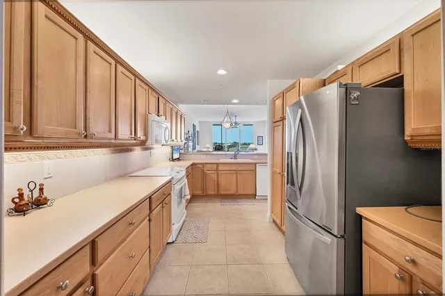 a living room with furniture a rug and a window