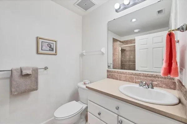 a view of a balcony with furniture