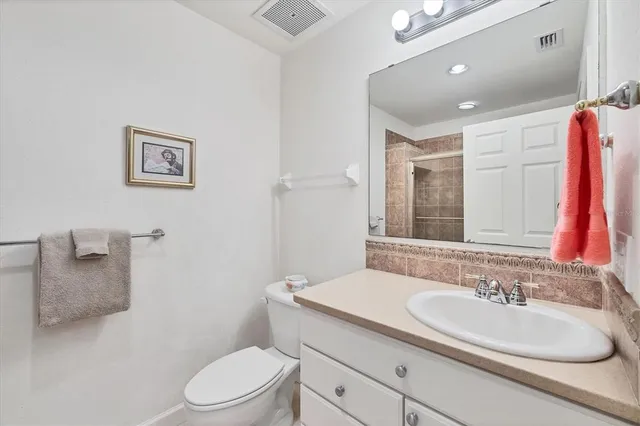 a view of a balcony with furniture