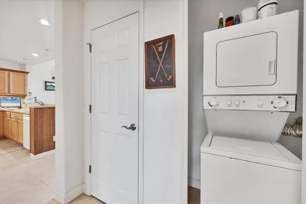 a view of a balcony with a table and chairs