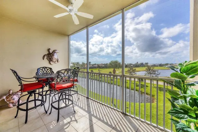 a view of a large pool with a yard