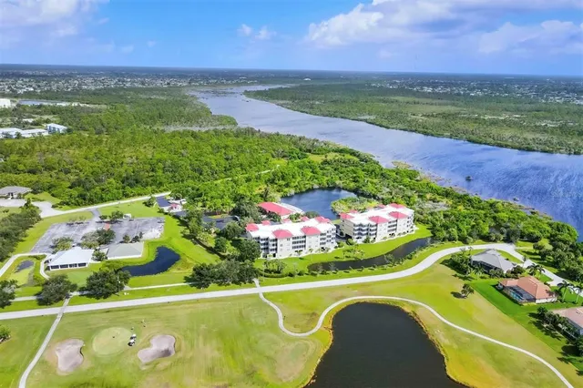 a view of a terrace with yard and lake view