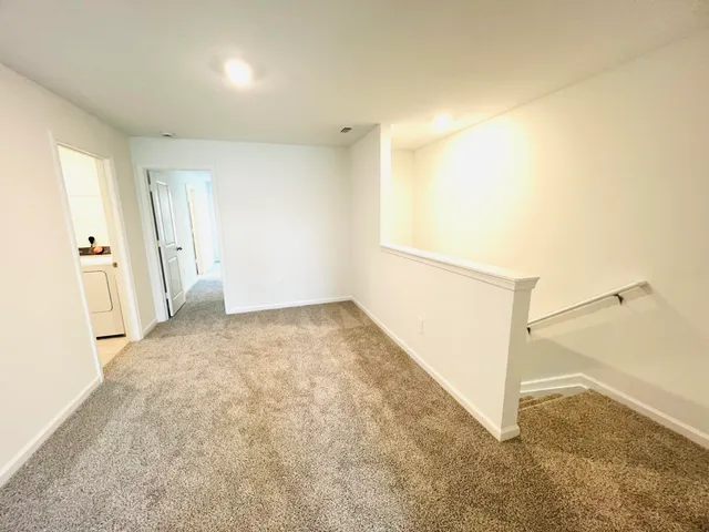 an empty room with a natural light