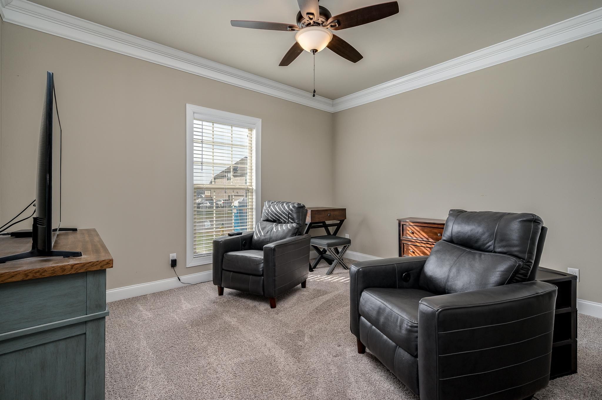 640 Twin View Drive Murfreesboro, TN 37128 - Photo 15 of 33 a living room with furniture a ceiling fan and a window