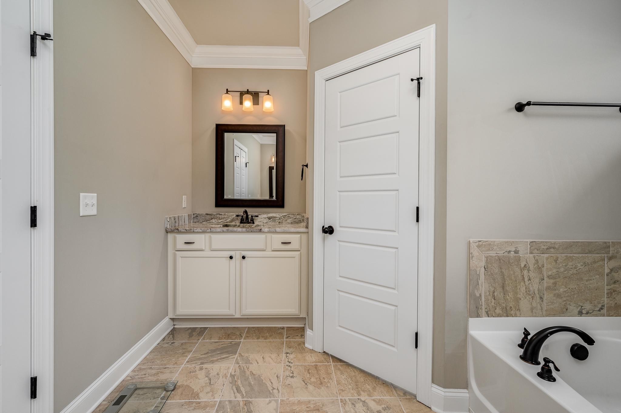 640 Twin View Drive Murfreesboro, TN 37128 - Photo 21 of 33 a bathroom with a sink and a mirror