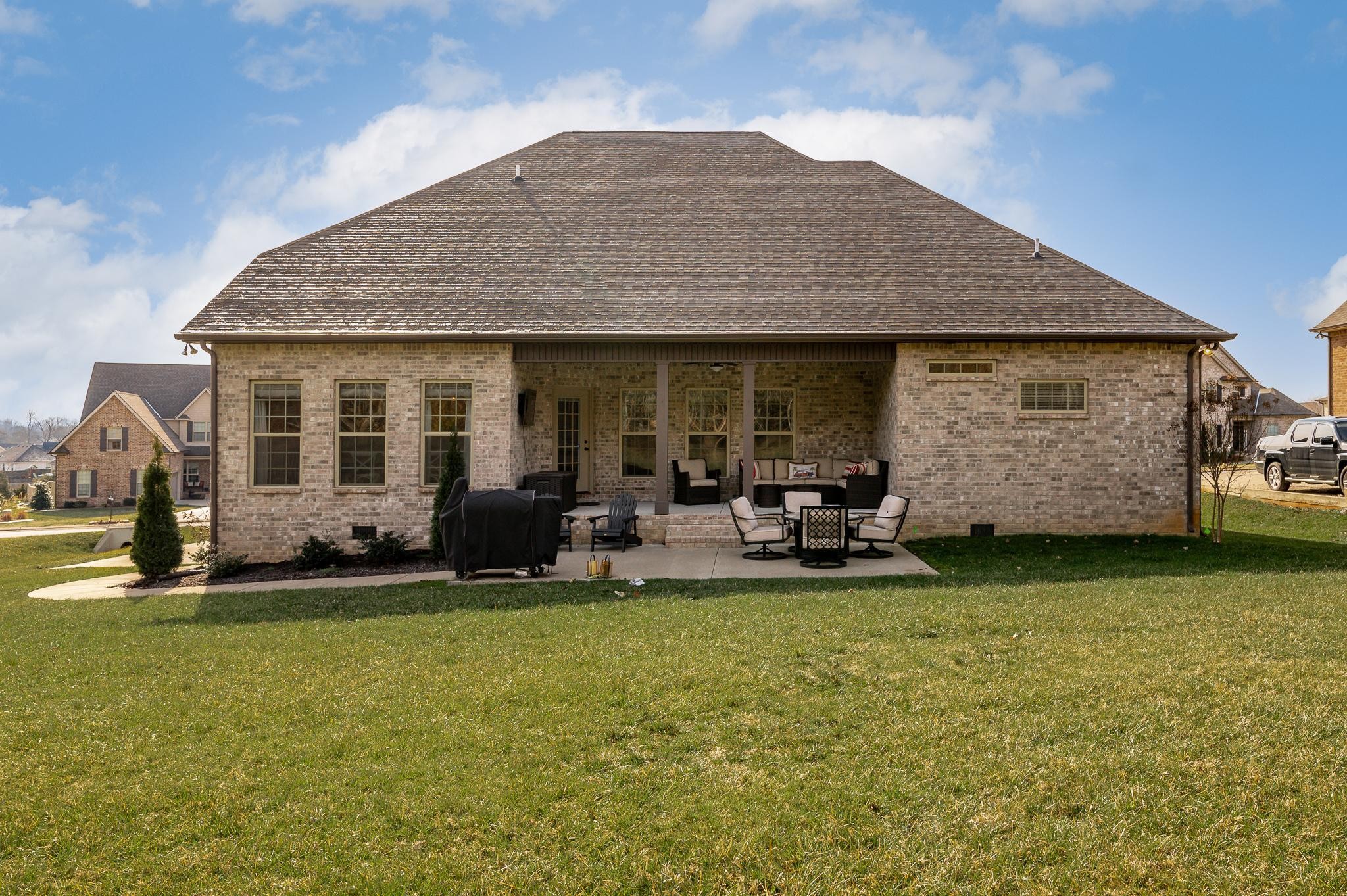 640 Twin View Drive Murfreesboro, TN 37128 - Photo 29 of 33 a view of a house with backyard porch and sitting area