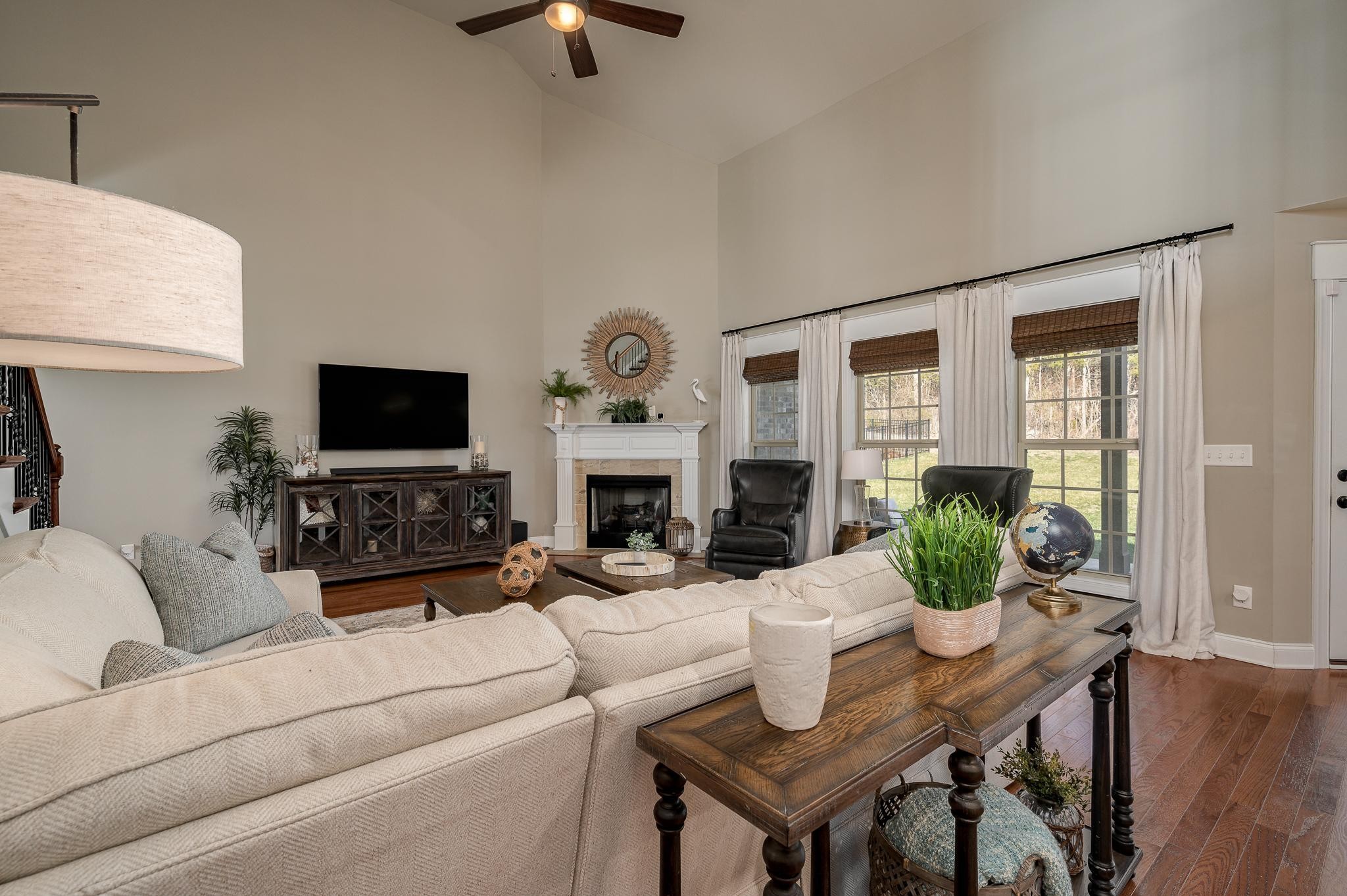 640 Twin View Drive Murfreesboro, TN 37128 - Photo 5 of 33 a living room with furniture a fireplace and a flat screen tv