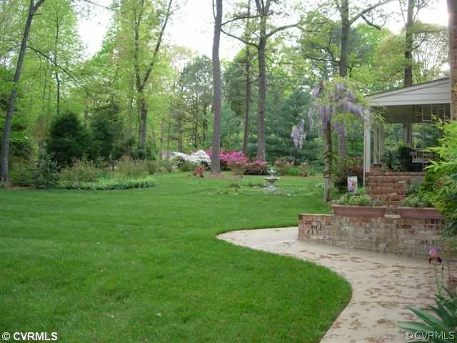 12811 Singer Road Midlothian, VA 23112 - Photo 11 of 12 a view of a park with large trees