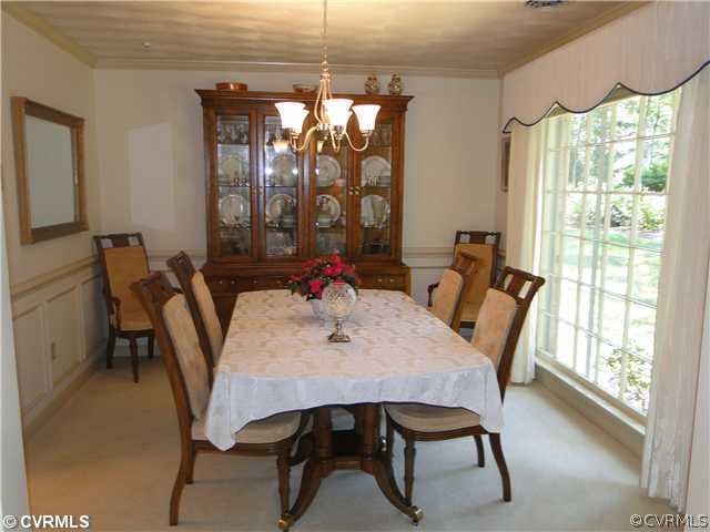 12811 Singer Road Midlothian, VA 23112 - Photo 4 of 12 a view of a dining room with furniture window and outside view
