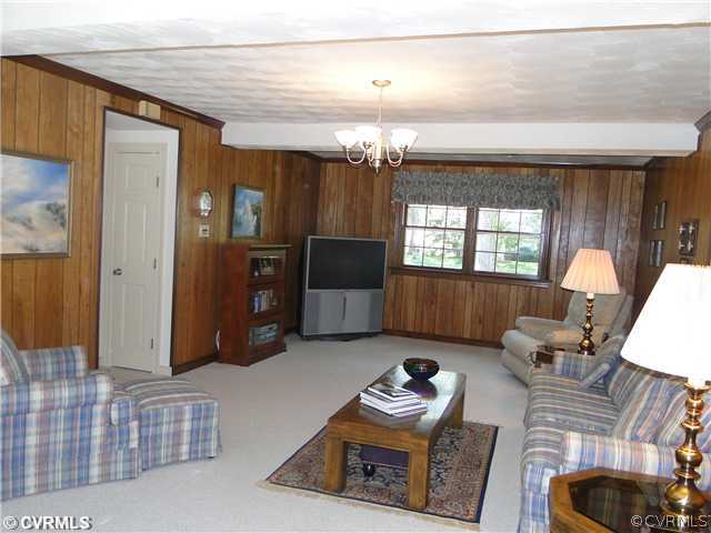 12811 Singer Road Midlothian, VA 23112 - Photo 6 of 12 a living room with furniture and a window
