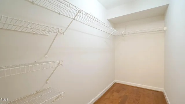 a view of a room with racks on the wall