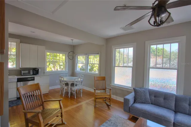 a view of a livingroom with furniture window and outside view