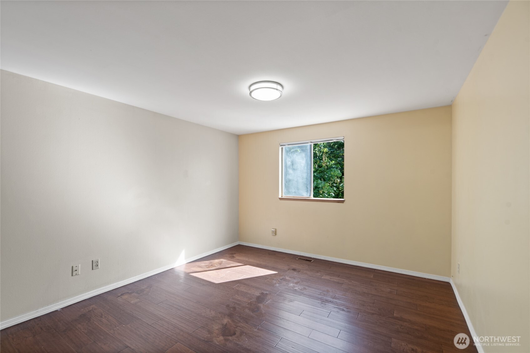 10606 68th Place South Seattle, WA 98178 - Photo 16 of 31 an empty room with wooden floor and window