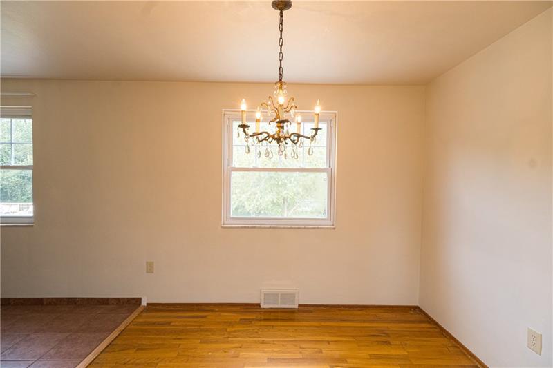 31 Highbury Road Cheswick, PA 15024 - Photo 11 of 25 VIEW OF THE OPEN DESIGN OF THE DINING ROOM AND KITCHEN.