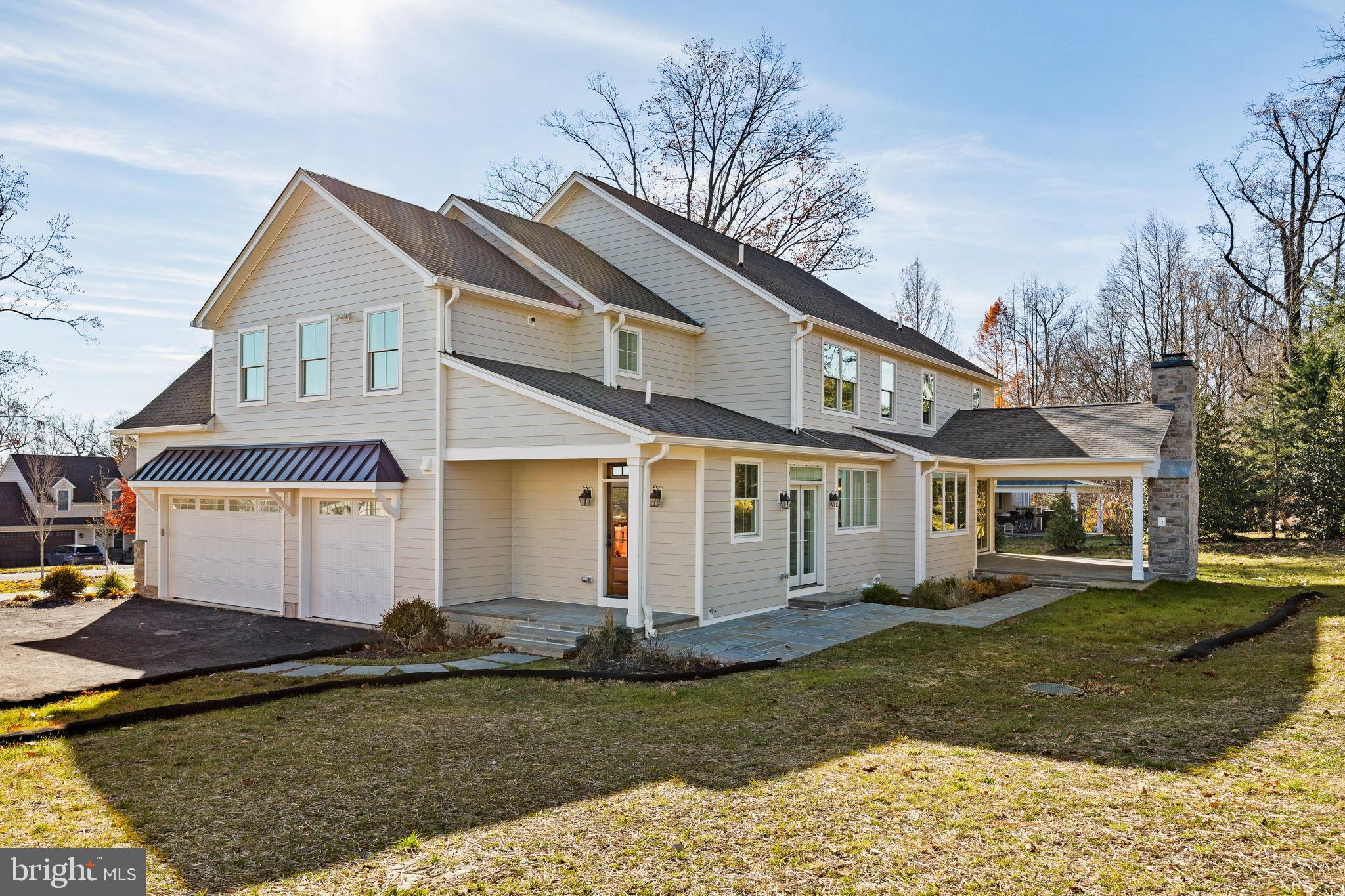 16 Fariston Road Wayne, PA 19087 - Photo 101 of 106 a front view of a house with a yard