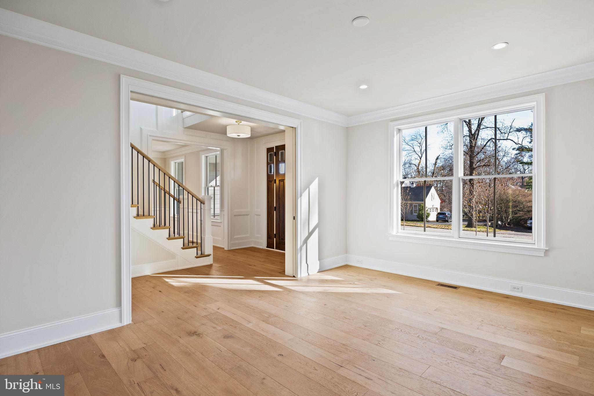 16 Fariston Road Wayne, PA 19087 - Photo 12 of 106 a view of a big room with wooden floor and windows