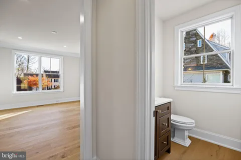 a kitchen with stainless steel appliances a sink stove and refrigerator