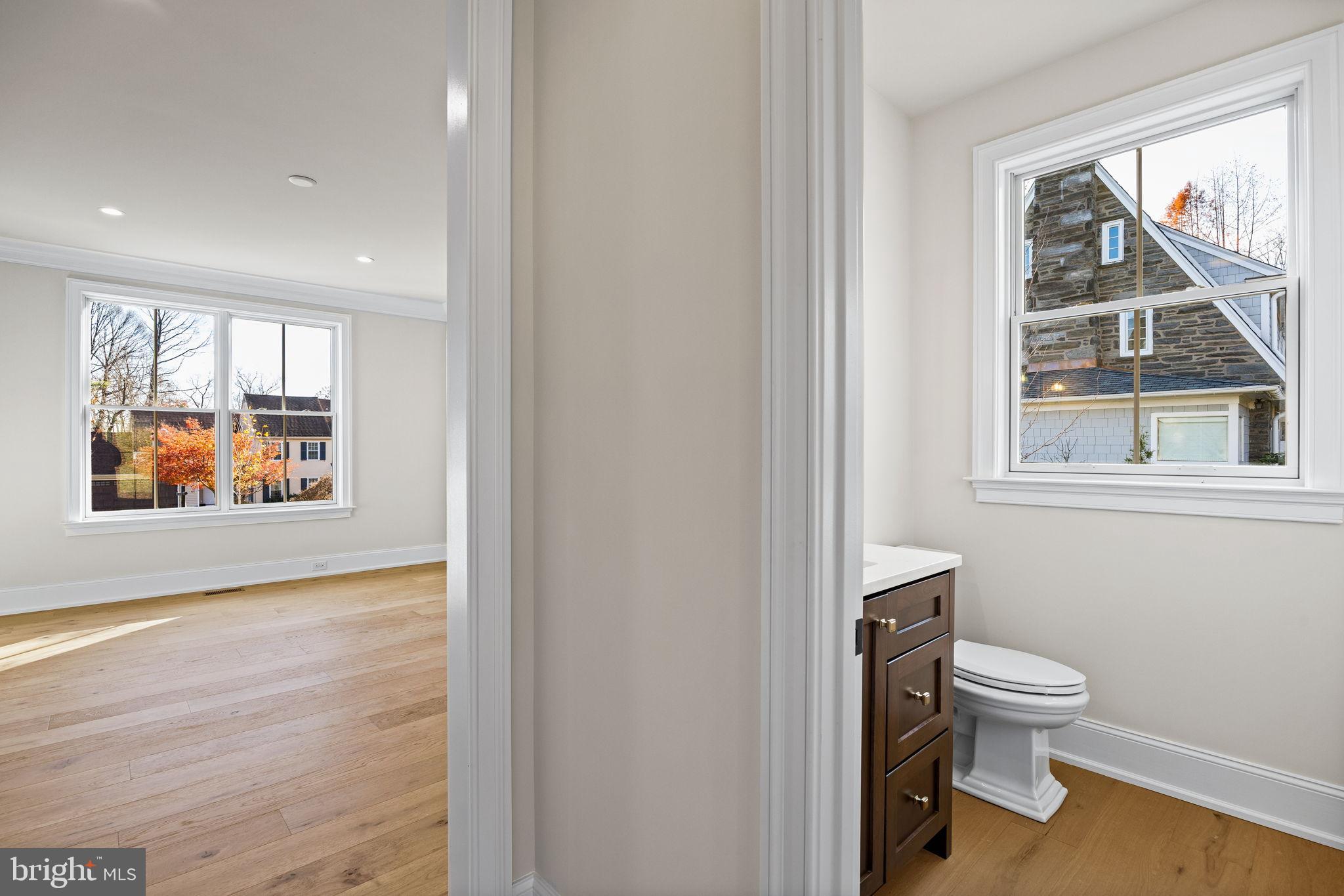 16 Fariston Road Wayne, PA 19087 - Photo 15 of 106 a bathroom with a toilet and a window