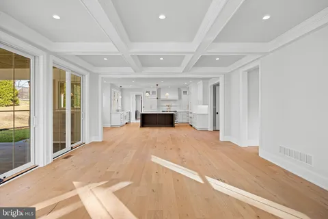 a kitchen with stainless steel appliances granite countertop a sink and a stove