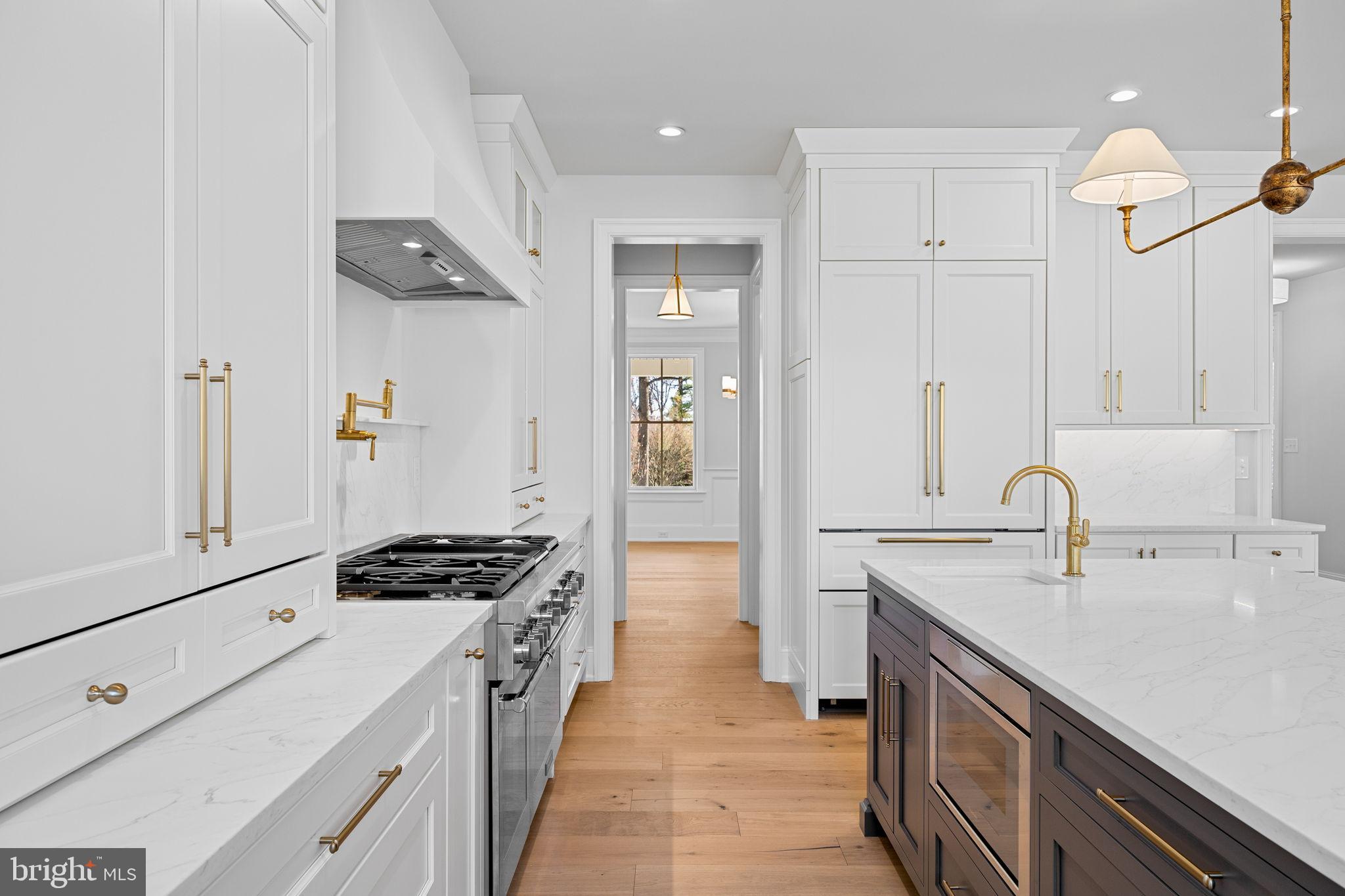 16 Fariston Road Wayne, PA 19087 - Photo 29 of 106 a kitchen with stainless steel appliances a sink stove and refrigerator