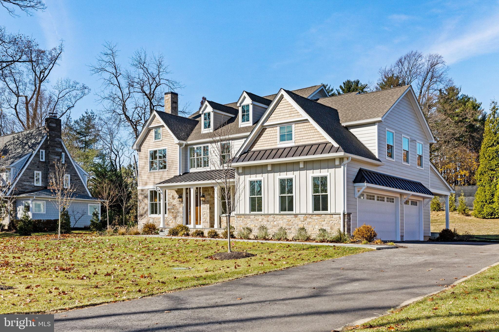 16 Fariston Road Wayne, PA 19087 - Photo 4 of 106 a front view of a house with a yard