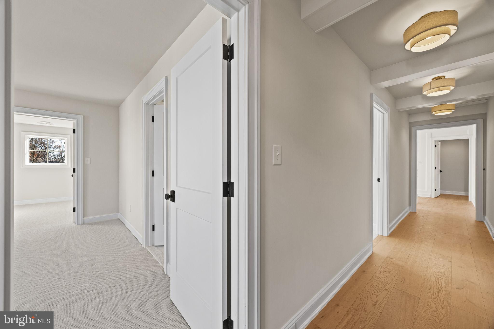 16 Fariston Road Wayne, PA 19087 - Photo 74 of 106 a view of hallway with wooden floor