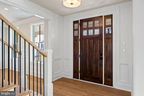 a living room with a fireplace and a window