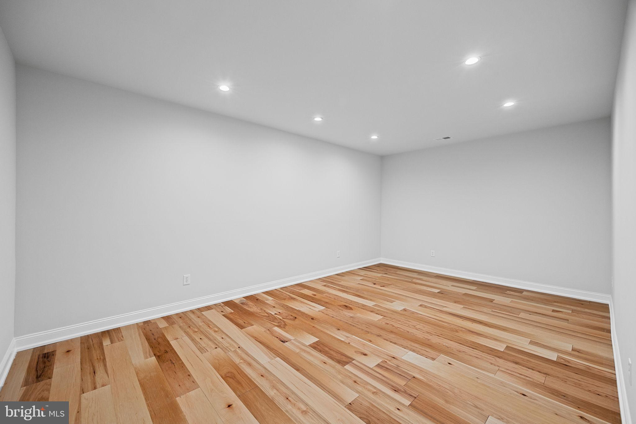 16 Fariston Road Wayne, PA 19087 - Photo 92 of 106 a view of empty room with wooden floor