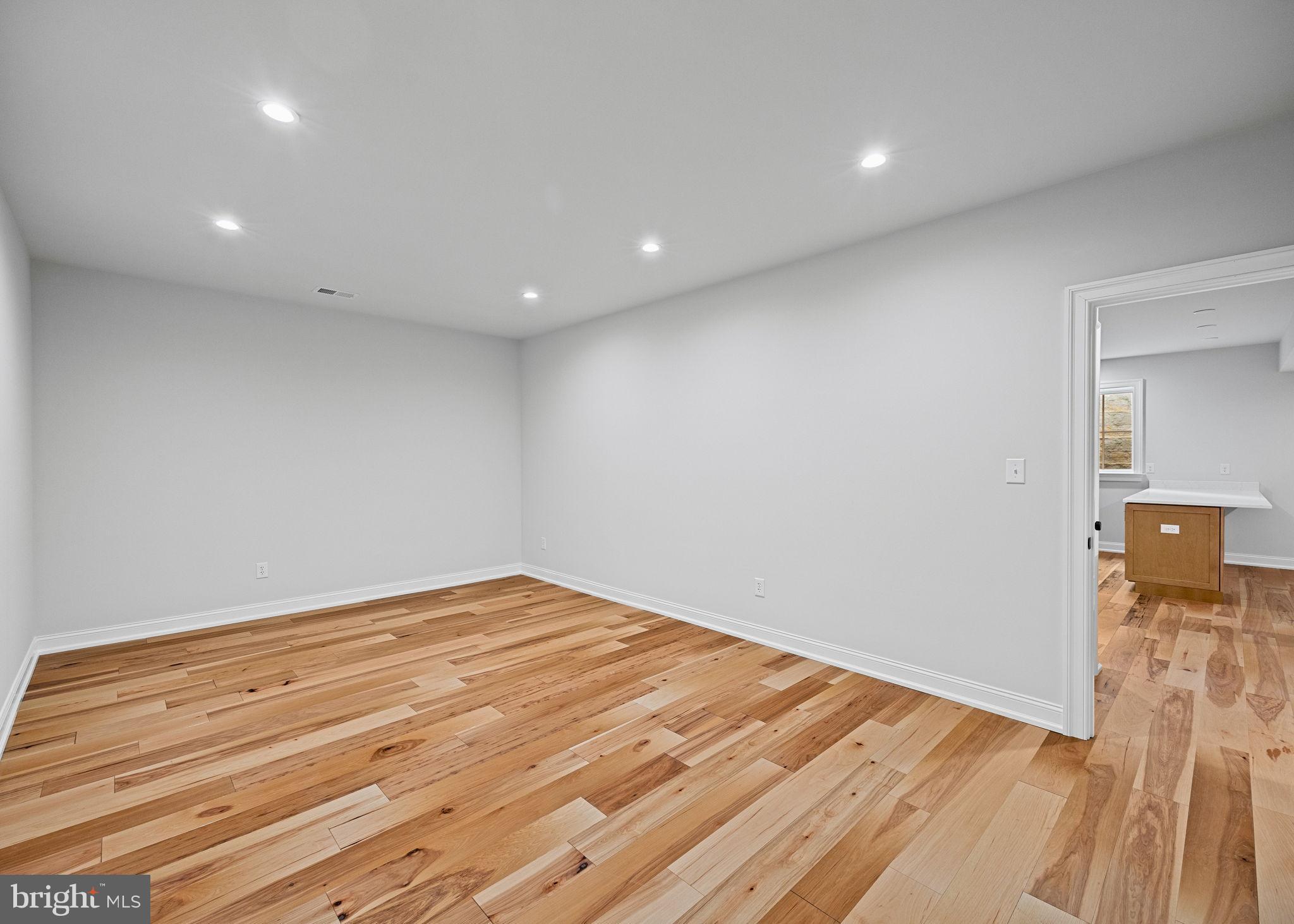 16 Fariston Road Wayne, PA 19087 - Photo 93 of 106 a view of empty room with wooden floor