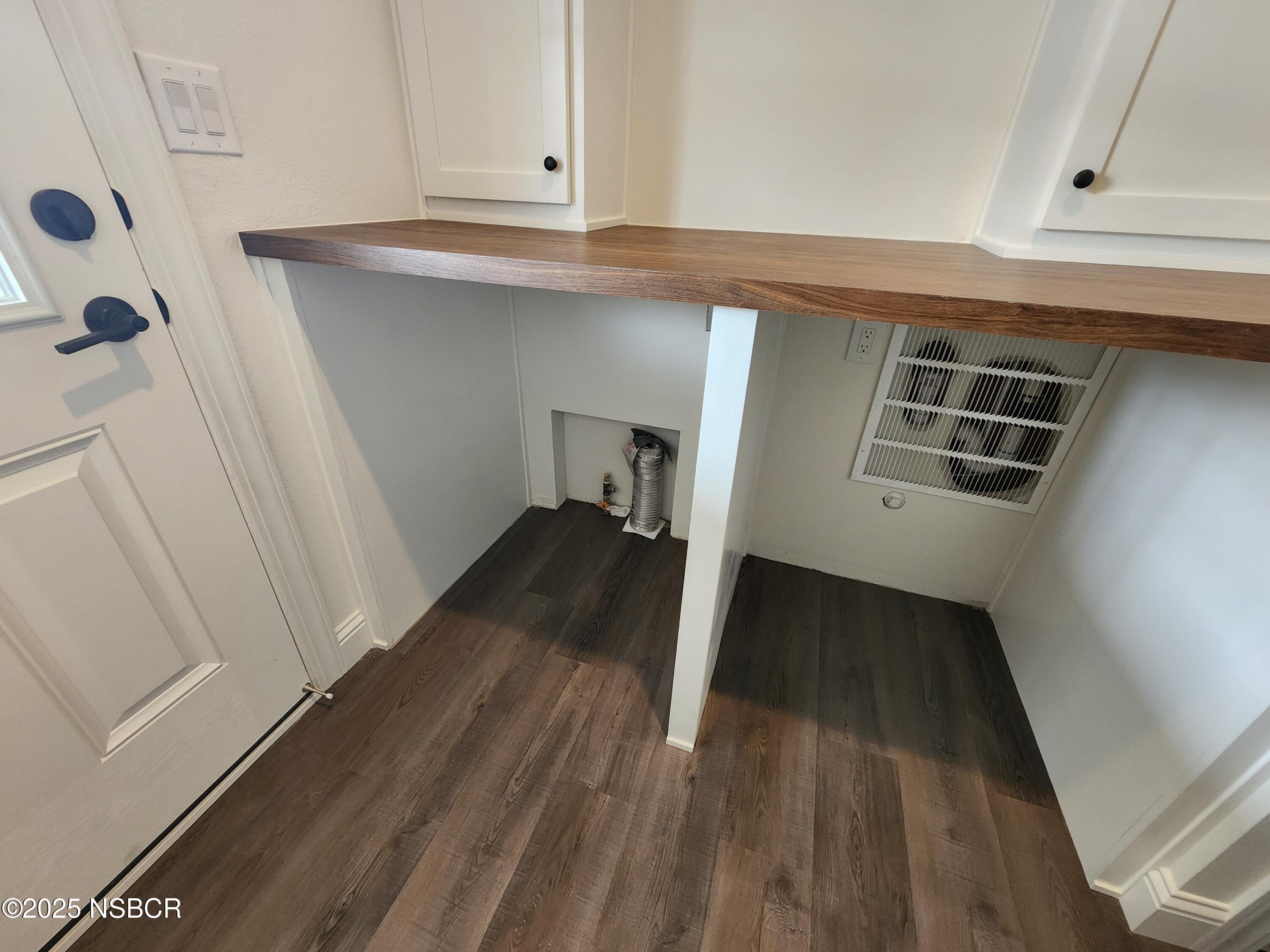 87 Rio Vista Solvang, CA 93463 - Photo 16 of 18 a view of a hallway with wooden floor and staircase
