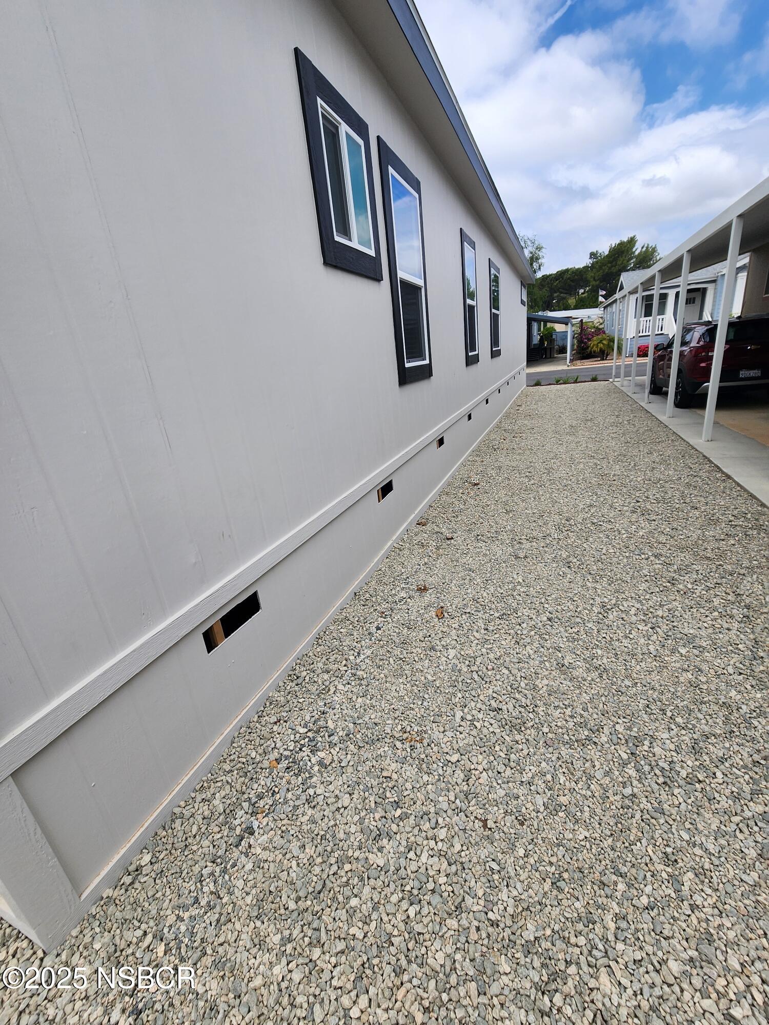 87 Rio Vista Solvang, CA 93463 - Photo 18 of 18 a view of a porch with wooden floor and fence